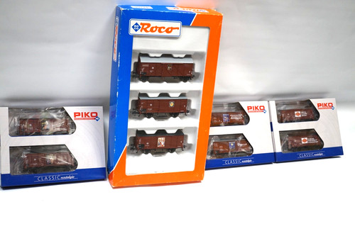 H0 Roco 44166 + PIKO 58368 A+B + 58373 A+B + 58366 A+B Güterwagen mit Werbung DR | Zustand: Neu