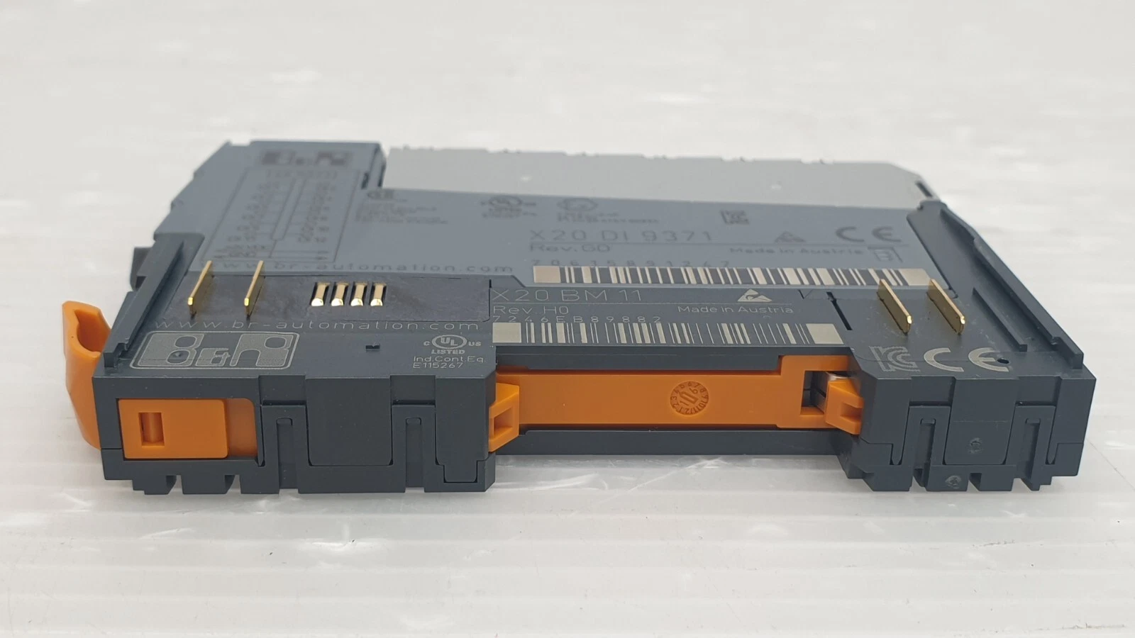 Bottom view of the X20DI9371 with the X20BM11 bus module and orange locking lever