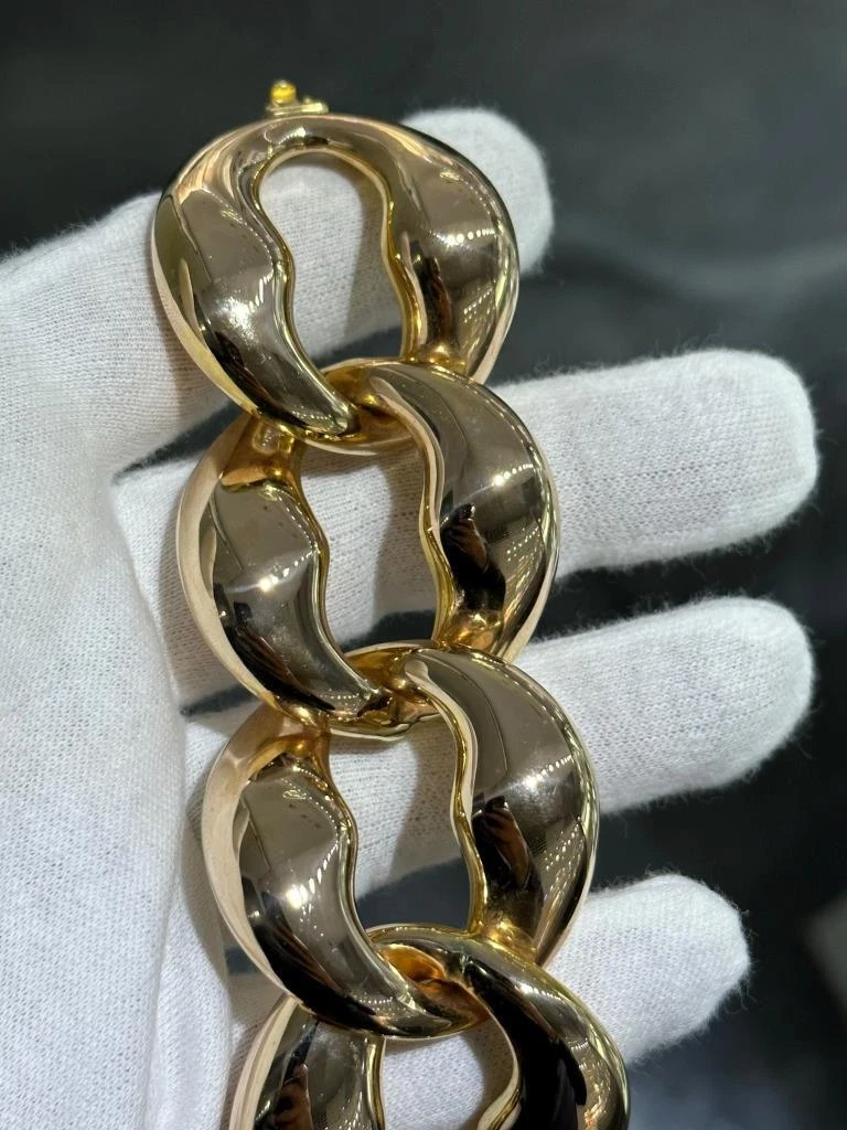 Grand bracelet bascule design lien gonflé Gucci en or jaune 14 carats