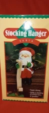 Hallmark Stocking Hanger SANTA CLAUSE Checking His List!