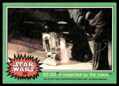 1977 Topps Star Wars #228 R2-D2 is inspected by the Jawas - POOR