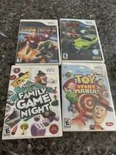 Lot Of 4 Nintendo Wii Iron Man 2 Monster Trucks Disney Toy Story Family Game Ngt