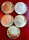 1964 Kennedy half-dollars; Lot of 5; 90% silver; fine and better; sharp coins