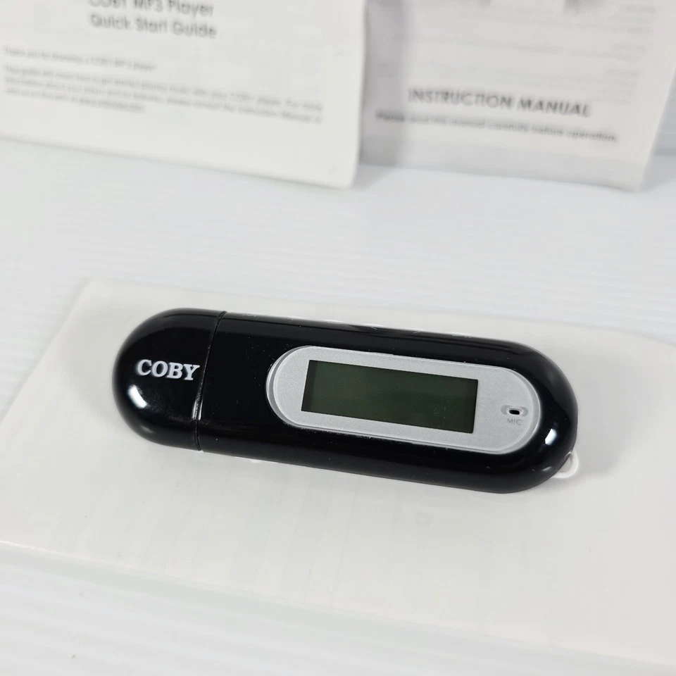 Reproductor de audio MP3 Coby MP-C855 ( 512 MB) sintonizador FM USB 240 canciones negro - probado Foto 2 de 4