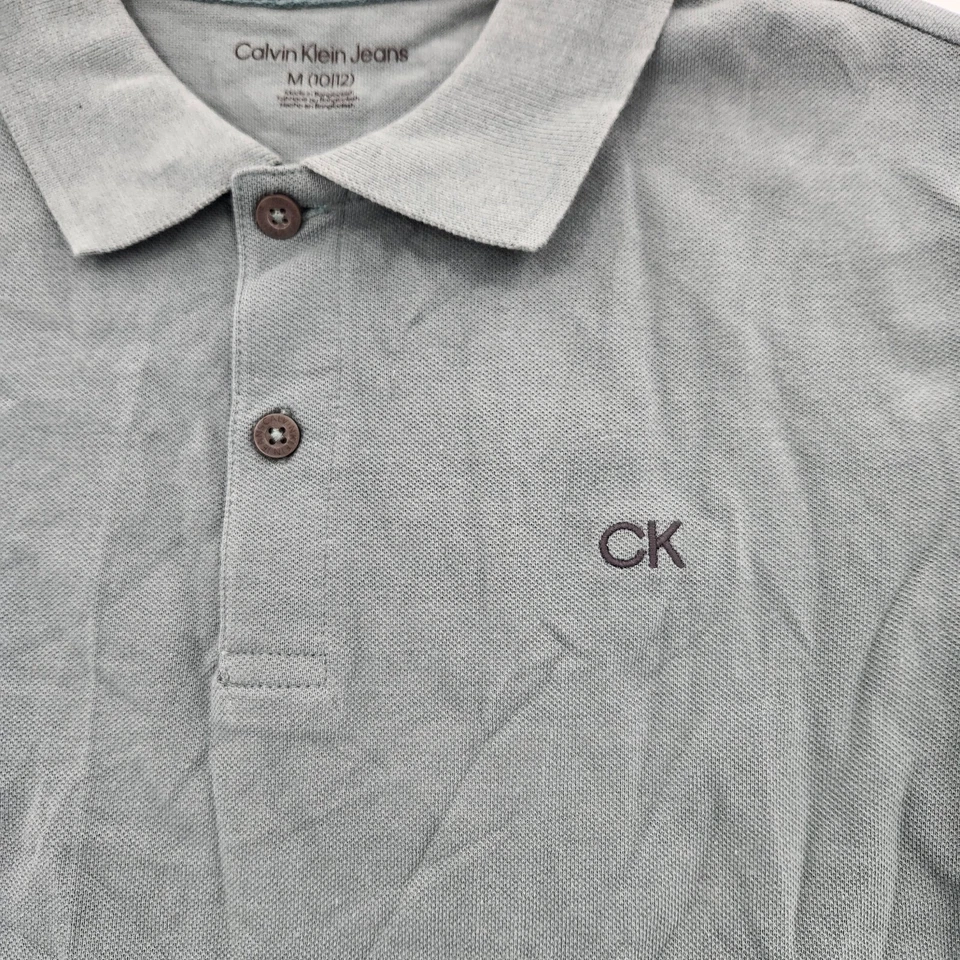 Camisa Polo Calvin Klein Niños Jóvenes Talla M 10/12 Manga Corta Logo  Foto 3 de 4