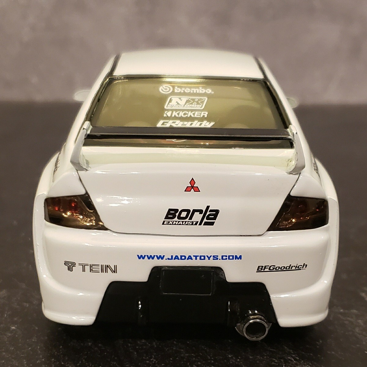 Jada Toys Mitsubishi Lancer EVO Import Racer White 1:24