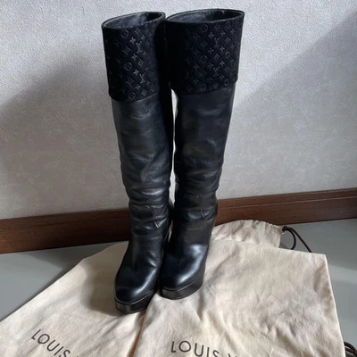 LOUIS VUITTON Bottes Longues 35 Femme - Photo 1/4