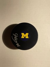 Michigan Wolverines SEAMUS CASEY Signed Hockey Puck