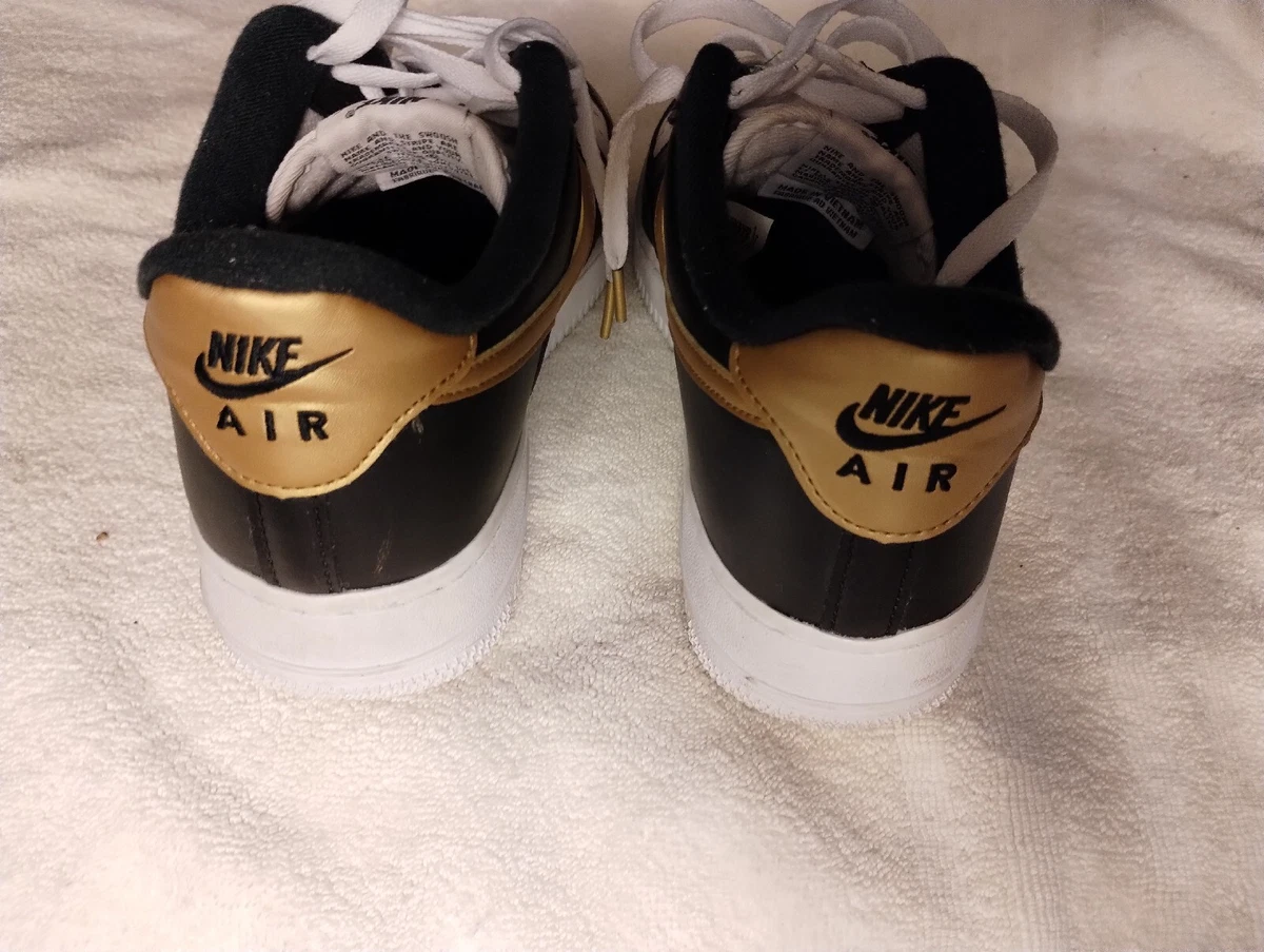 Nike af1 black clearance gold