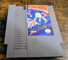 To the Earth Nintendo NES. Tested And Works Great.  Authentic.  Excellent