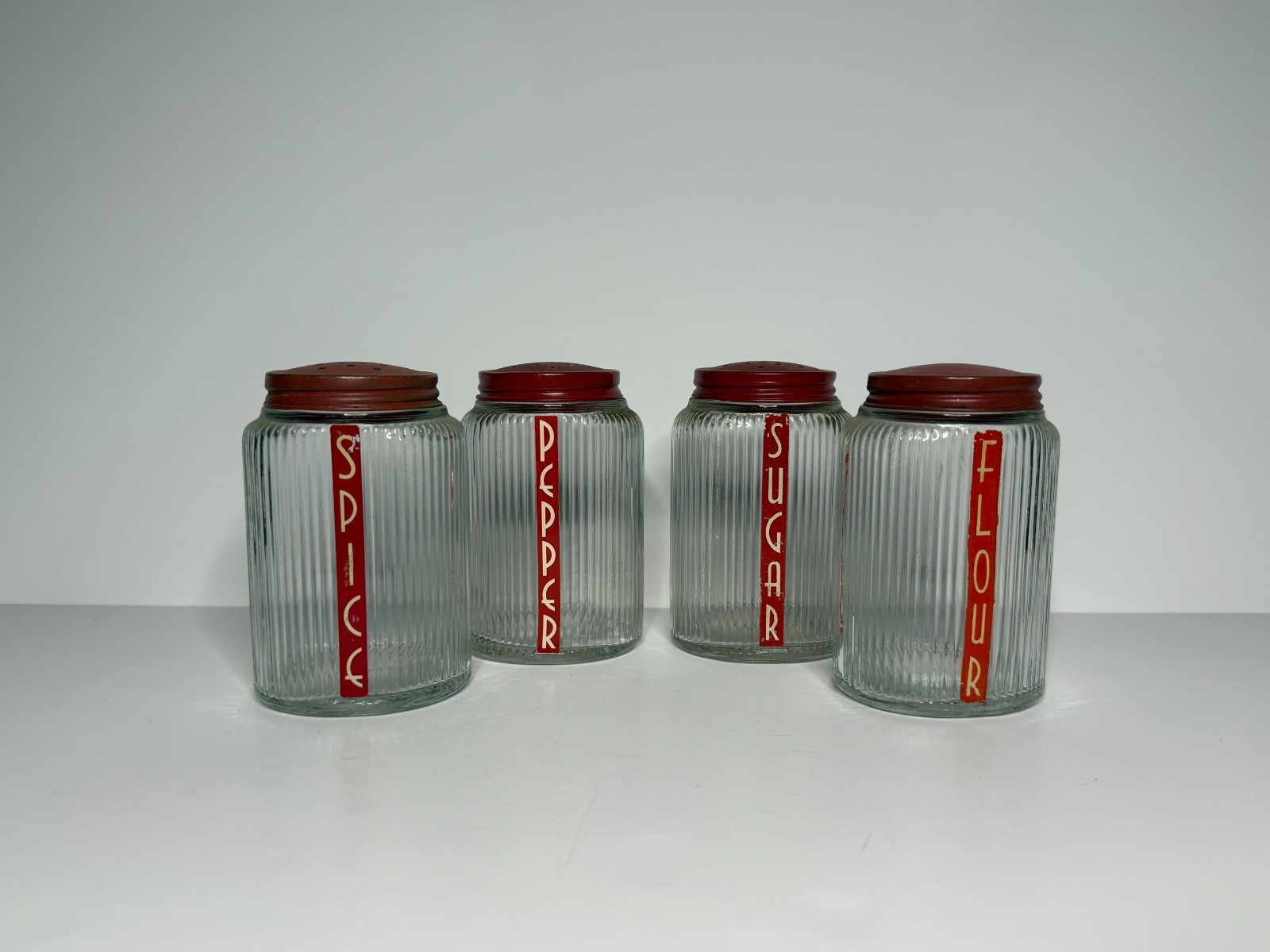 1930s Owens-Illinois Ovid Glass Canister Set 4 Pc original labels and lids