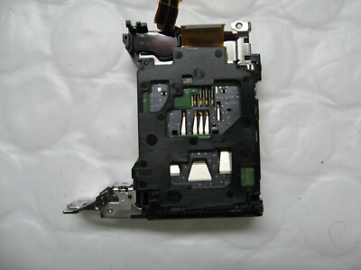 Sony DSC-RX100 Battery compartment and SD Card Slot  ORIGINAL REPAIR PART,