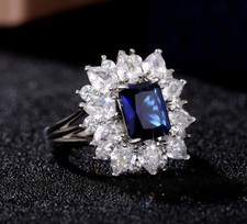 14.65TCW Royal Blue Sapphire With Vivid White CZ 935 Silver Cluster Halo Ring