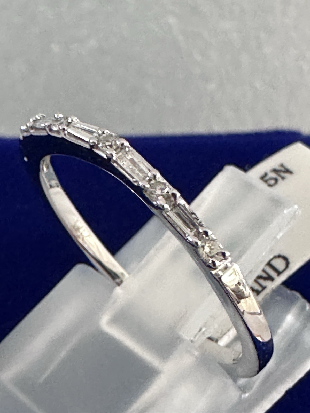 Diamond wedding band 14 kt.white gold size 7.-image