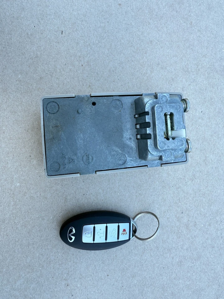 Módulo actuador de bloqueo de columna de dirección Infiniti M56 2011-2013 con llavero OEM Foto 4 de 4