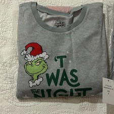 Grinch PJ set. New in packaging. Women's/Unisex. Size Medium