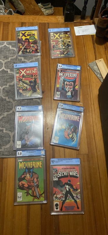 HUGE 50lbs COMIC BOOK LOT- graded and non graded.