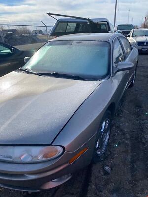 Used Left Headlight Assembly fits: 2003 Oldsmobile Aurora Left Grade A