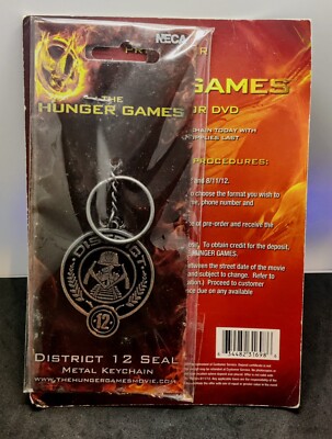 NIP The Hunger Games District 12 Seal Metal Keychain Pre Order Promo 2012 NECA 
