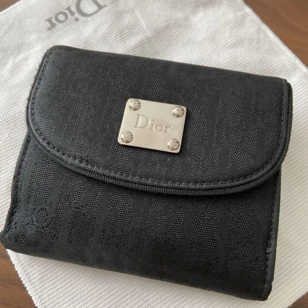 Portefeuille Dior noir à deux volets avec sac de rangement