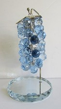 LIGHT BLUE CRYSTAL GRAPES ON STAND