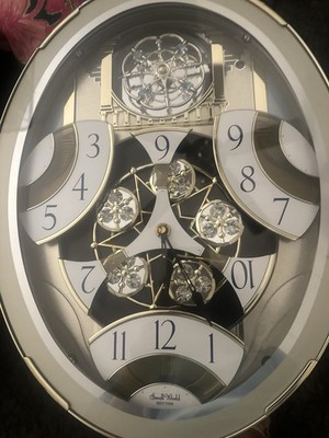 Rhythm Small World Swarovski Crystal Magic Motion Musical Clock Used. Y2985F