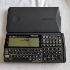 Sharp PC-G850 pocket computer vintage used with LCD leak and scratches