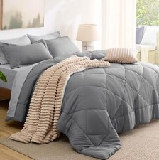 7-piece reversible bedding set with duvet cover, sheets, pillowcases and shams