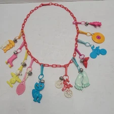 1980's Vintage Plastic Clip-On Bell Charm Red Necklace With 11 Charms