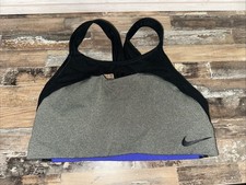 Reggiseno sportivo Nike donna supporto medio foderato senza ferretto grigio e nero taglia M
