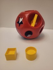 Tupperware Shape-O Toy with 1 round  4 square shapes
