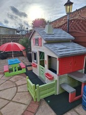 smoby playhouse including table bench with umbrella and green mats