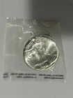1988 $1 Silver American Eagle Uncirculated in plastic packaging from Littleton