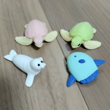 Sea turtle, seal, sunfish figure
