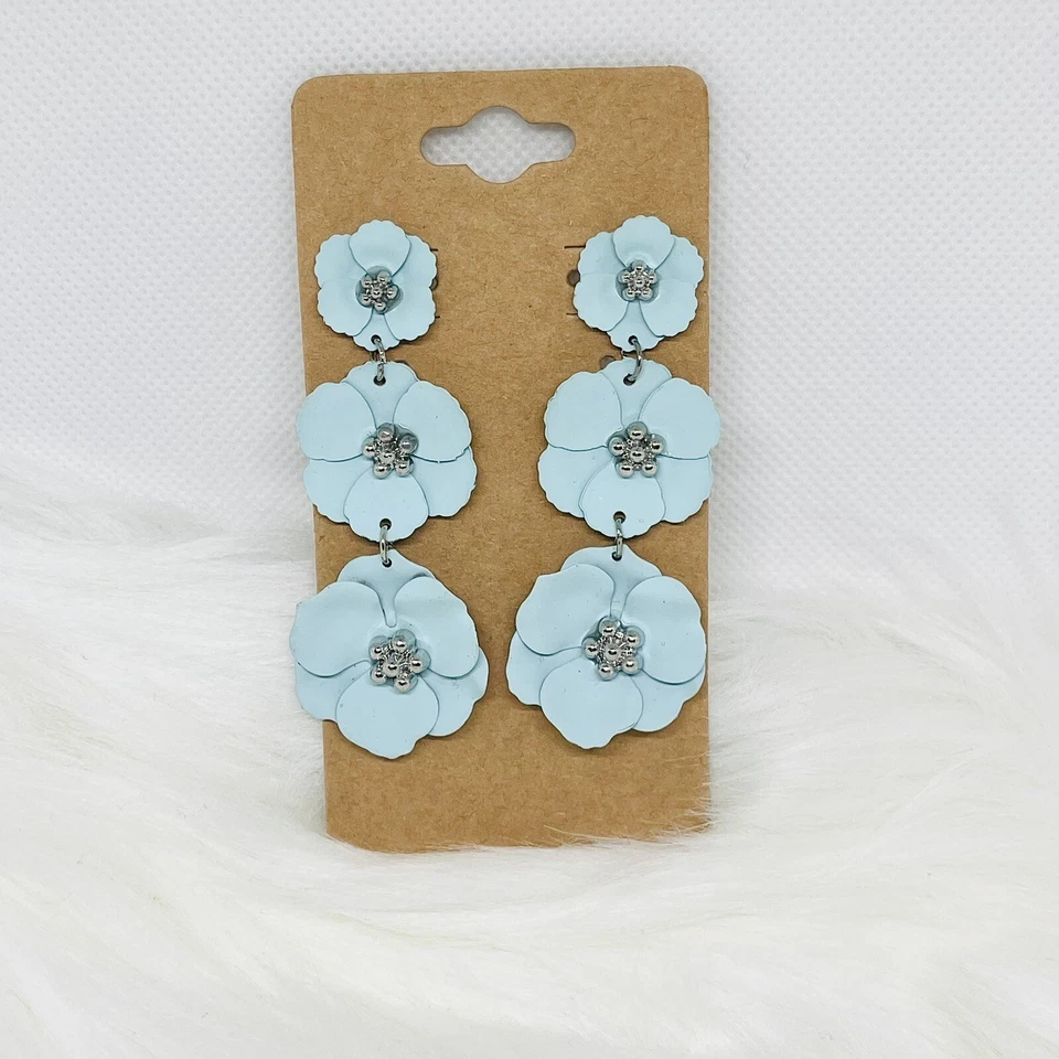 Pendientes de cerámica con flores azules Foto 3 de 4