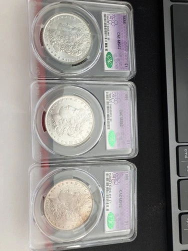 Lot Of 3 Morgan Silver Dollars - 1888 MS62 CAC - One Is Toner