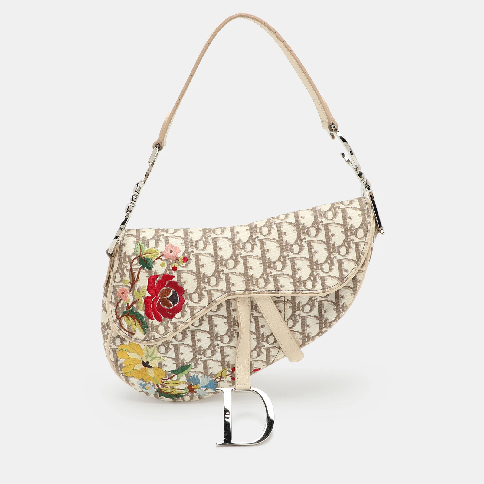 Épaule selle Dior beige/blanc oblique toile et cuir brodé de fleurs