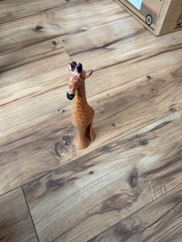 carved giraffe figurine