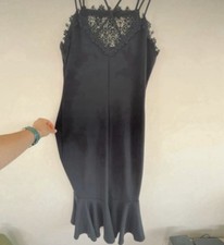 Lacy little black dress. Next. Mermaid fit and flare shape. Strappy. Size 14
