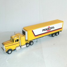 FREIGHTLINER 1/56 CAMION A RIMORCHIO PENNZOIL MADE IN MACAU A TRAZIONE