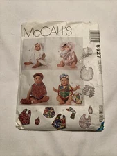 McCalls Sewing Pattern 6627 Infants Bib Hat Diaper Cover and Bottle Cover Uncut