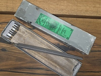 Partial box of NOS Nicholson, 7'' three square taper handsaw files