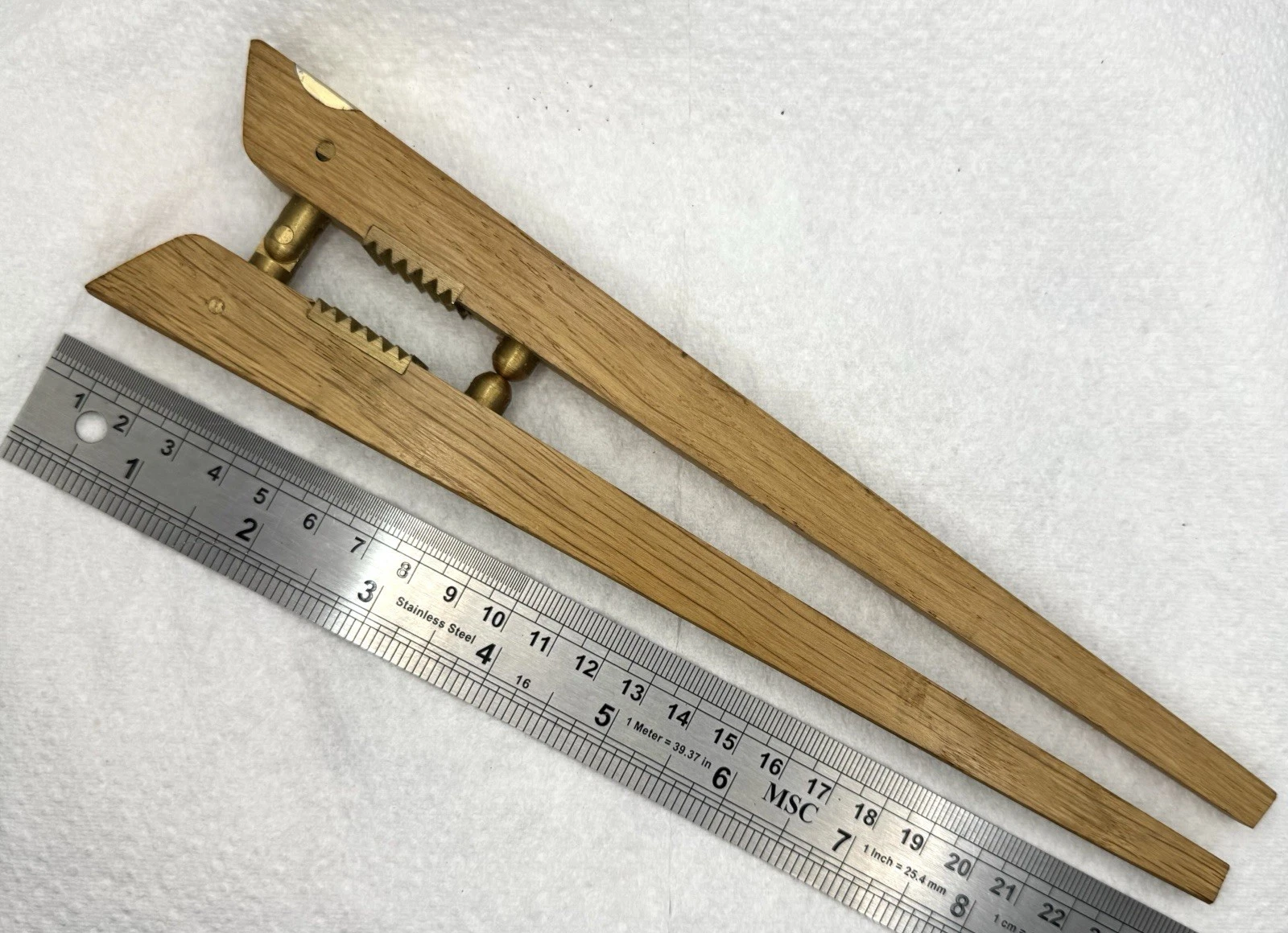 1950’s Danish Brass and Teak Nutcracker. Designed By Poul Knudsen. With Sticker.
Opens in a new wind