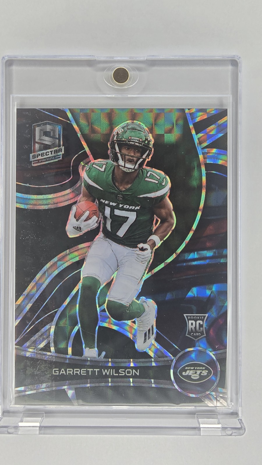 2022 Panini Spectra - Rookies Garrett Wilson #145 Interstellar Prizm /60 (RC)