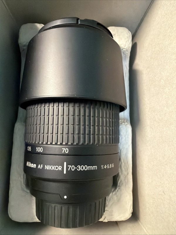 Nikon AF Nikkor 70-300mm 1:4-5.6G Full Frame Lens with HB-26 Hood.