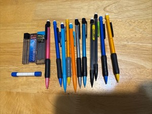 11 Mechanical Pencils And Extra .7 Lead with Replacement Erasers Used .5,.7, .9
