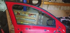 Corsa F N/S front glass (local pickup only)