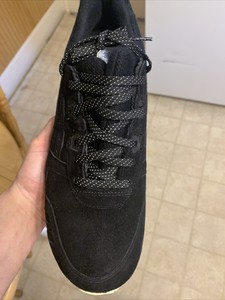 asics reigning champ black