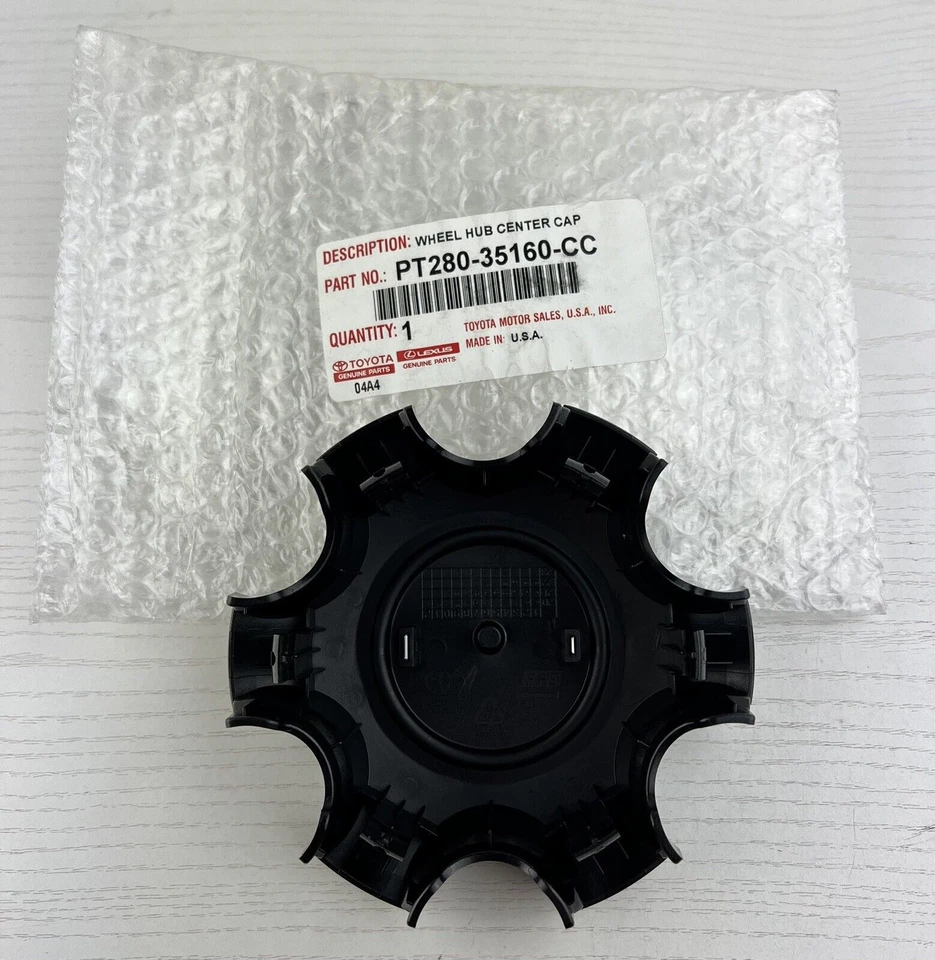 Tapa central 16-22 Toyota Tacoma OEM 42603 YY290 (NUEVO) carbón PT280-35160 -CC Foto 2 de 2