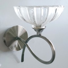 Litecraft Applique da Parete 1 Braccio con Paralume in Vetro Trasparente - Nichel Satinato Liquidazione      